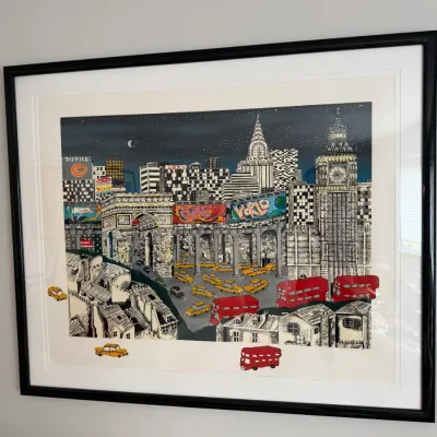 Framed 3D pop art print by Charles Fazzino, depicting a whimsical, multi-layered cityscape with iconic global landmarks, matted and...