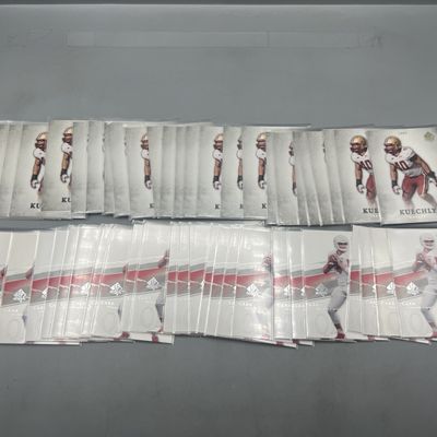 Sale Photo Thumbnail #40: (50) 2012 Upper Deck SP Authentic Luke Kuechly RCs #65 & 2014 Upper Deck SP Authentic Derek Carr RCs #10 - (25) Of Each