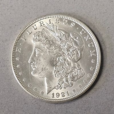 Sale Photo Thumbnail #22: 1921 Philadelphia Morgan Silver Dollar