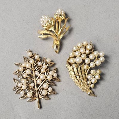 Sale Photo Thumbnail #123: Three Vintage Faux Pearl Brooches Inc Trifari