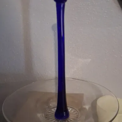 Sale Photo Thumbnail #90: Vintage clear glass console bowl featuring a tall, cobalt blue glass center spindle.