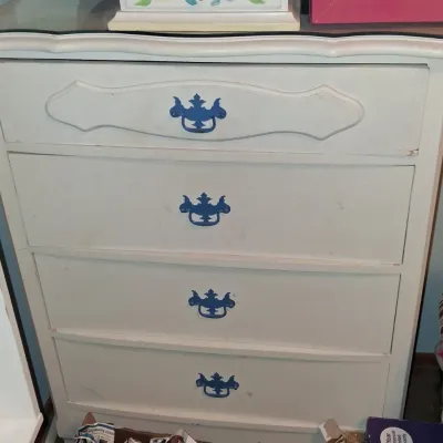 Sale Photo Thumbnail #39: Vintage French Provincial style four-drawer chest of drawers, painted off-white with contrasting blue metal hardware.