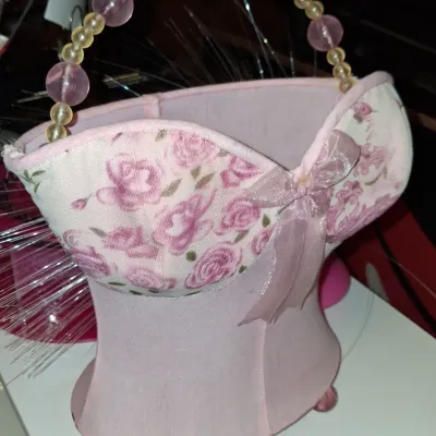 Sale Photo Thumbnail #9: Novelty corset-shaped fabric basket in pink floral print, featuring a beaded handle and ribbon bow detail.