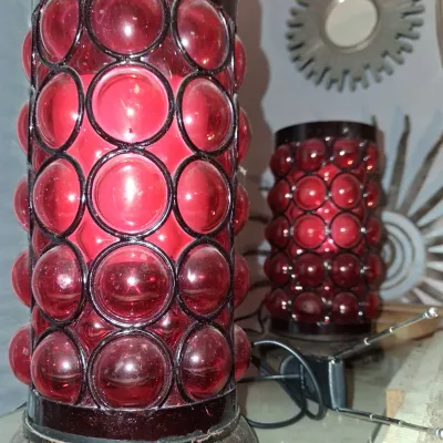 Sale Photo Thumbnail #141: Pair of mid-century modern red glass bubble cylinder lamps with black metal frames.
