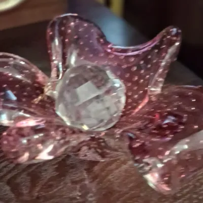 Sale Photo Thumbnail #112: Vintage pink Murano bullicante art glass bowl in a ruffled flower shape, featuring a faceted clear crystal sphere resting in the center.