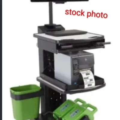 Sale Photo Thumbnail #254: Stock photo of a mobile workstation cart featuring a mounted monitor, integrated printer, and battery power system.