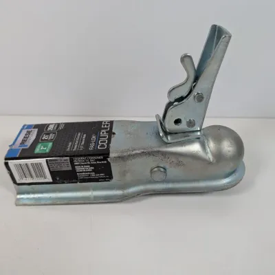 Sale Photo Thumbnail #134: Reese Towpower Fas-Lok trailer coupler, designed for a 2-inch hitch ball and 2.5-inch channel width, in unused condition with original retail label.