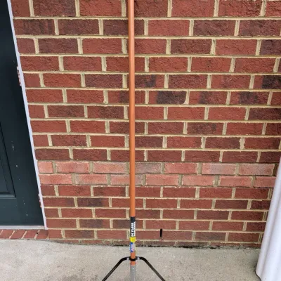 Sale Photo Thumbnail #181: Midwest Rake 24-inch floor squeegee with a long wooden handle, in clean, gently used condition.