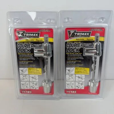 Sale Photo Thumbnail #131: Two Trimax TC123 adjustable universal coupler locks, brand new in their original clamshell packaging.