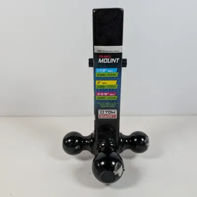 Sale Photo Thumbnail #141: TowSmart tri-ball trailer hitch mount, featuring 1-7/8 inch, 2 inch, and 2-5/16 inch black hitch balls with some minor scuffing from use.