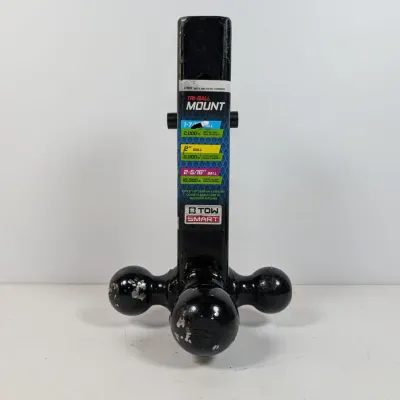 Sale Photo Thumbnail #144: TowSmart tri-ball trailer hitch mount with three different ball sizes, showing some paint wear from use.