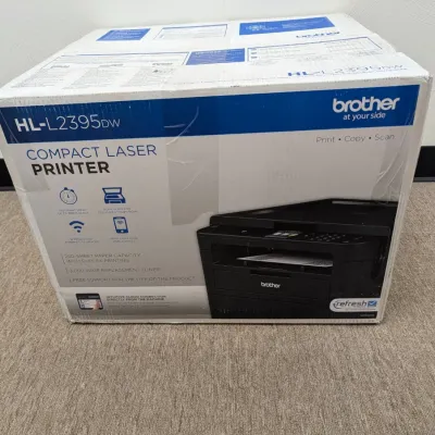 Sale Photo Thumbnail #220: Brother HL-L2395DW compact monochrome laser printer, new in its original retail box.