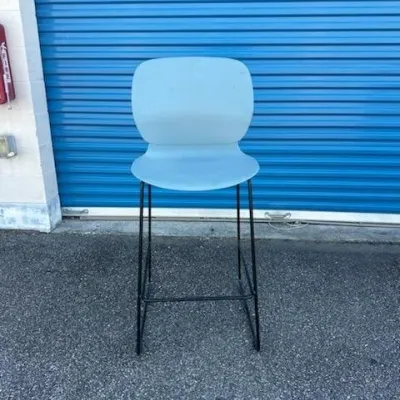 Sale Photo Thumbnail #43: Modern light blue molded plastic bar stool with a black metal wire frame base.