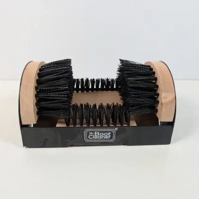 Sale Photo Thumbnail #296: Mr. Boot Cleaner outdoor shoe scraper featuring a black metal frame, wooden side supports, and stiff black bristles in clean, unused condition.
