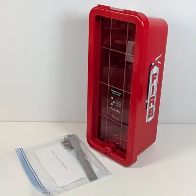 Sale Photo Thumbnail #103: Red plastic surface-mount fire extinguisher cabinet with a clear break-glass style front panel, shown with mounting hardware and instructions.