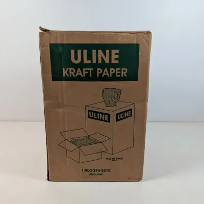 Sale Photo Thumbnail #299: Uline Kraft Paper dispenser box, showing some wear on the cardboard exterior.