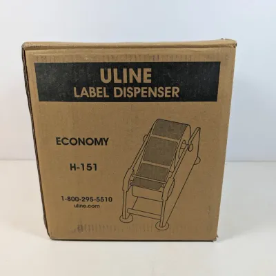 Sale Photo Thumbnail #313: Uline Economy H-151 label dispenser, packaged in its original cardboard box.