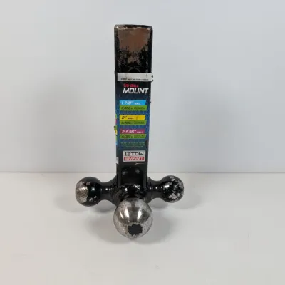 Sale Photo Thumbnail #138: Tow Smart tri-ball hitch mount featuring 1-7/8 inch, 2 inch, and 2-5/16 inch balls, showing some wear and scuffing from use.
