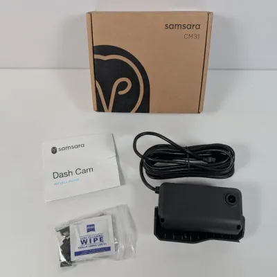 Sale Photo Thumbnail #169: Samsara CM31 dash cam with original box, installation guide, power cable, and lens cleaning wipe.