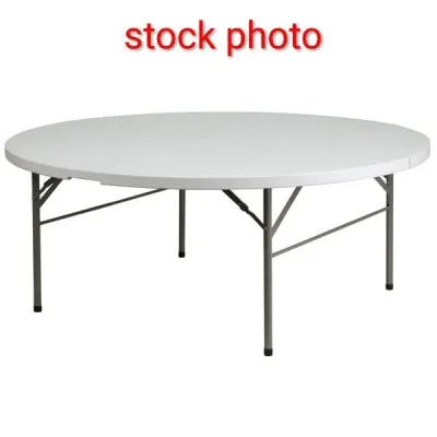 Sale Photo Thumbnail #74: Round white plastic folding table with grey metal legs, shown in a stock photo.