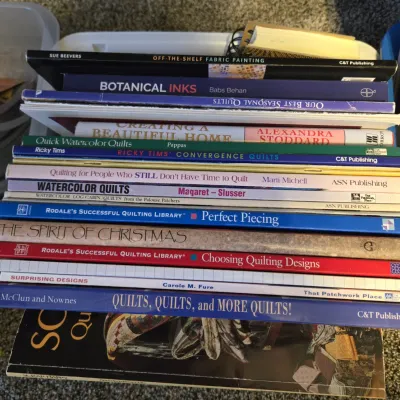 Sale Photo Thumbnail #23: Stack of craft and quilting books, including titles on botanical inks, watercolor quilts, and fabric painting.