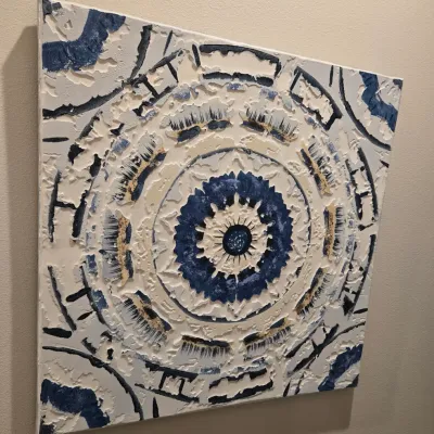 Sale Photo Thumbnail #59: Contemporary square canvas wall art featuring a textured, relief-style mandala design in shades of blue, white, and beige.