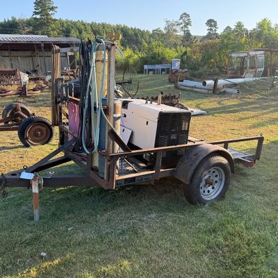 Sale Photo Thumbnail #8: Featured heavy equipment, tractors, machinery and additional equipment from the T.J. Bruck Estate Online Auction in Perryville, Arkansas. Take a look at the auction catalog for complete lot details, additional photos and bidding information.