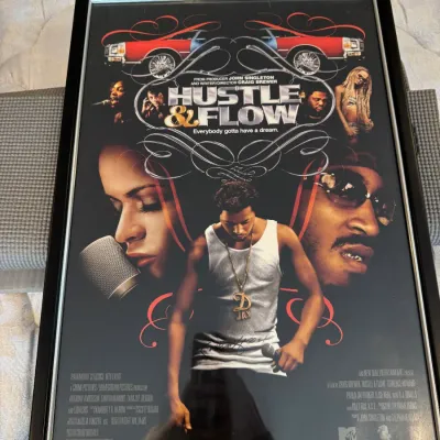Sale Photo Thumbnail #42: Framed promotional poster for the 2005 film "Hustle & Flow," featuring Terrence Howard, Taraji P. Henson, and Ludacris.