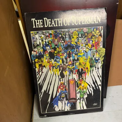 Sale Photo Thumbnail #106: Vintage "The Death of Superman" promotional poster on a foam board backing, featuring DC Comics superheroes mourning at Superman's casket, circa 1992.