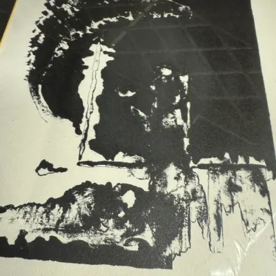 Sale Photo Thumbnail #13: Framed black and white abstract print, signed by the artist in the lower right corner.