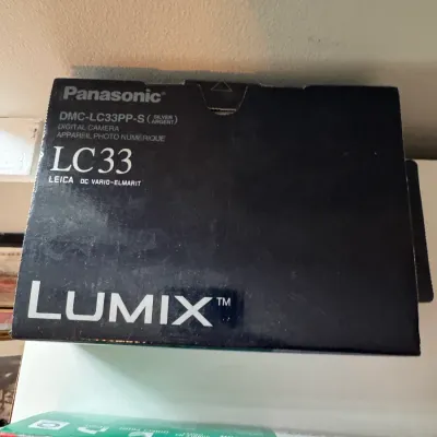 Sale Photo Thumbnail #226: Original box for a Panasonic Lumix DMC-LC33 digital camera, showing some light shelf wear.