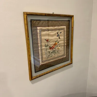 Sale Photo Thumbnail #22: Framed Chinese silk embroidery featuring a bird and floral motif, housed in a faux-bamboo gilt frame.