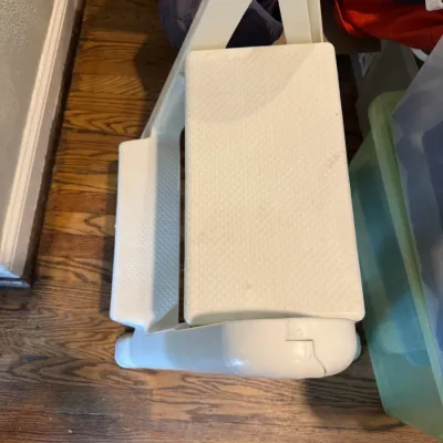 Sale Photo Thumbnail #281: White plastic folding two-step stool with textured treads, showing light wear from use.