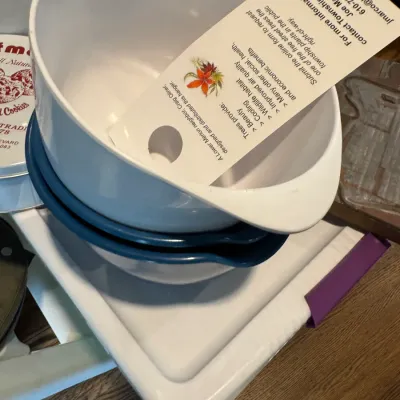 Sale Photo Thumbnail #280: Vintage Rosti Mepal melamine mixing bowls in white and blue, featuring integrated handles and pour spouts.