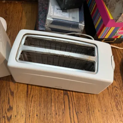Sale Photo Thumbnail #242: Krups white two-slice toaster with extra-wide slots, showing some light wear from use.