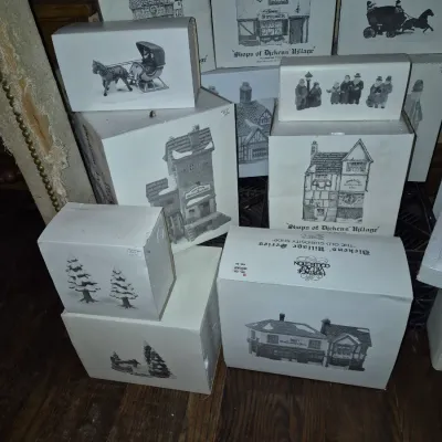 Sale Photo Thumbnail #3: Collection of Department 56 Heritage Village Collection Dickens' Village Series collectible houses and accessories in original boxes.