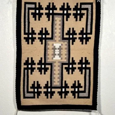 Sale Photo Thumbnail #12: Hand-woven Navajo Two Grey Hills style rug featuring a symmetrical geometric pattern in natural tones of cream, grey, black, and tan.