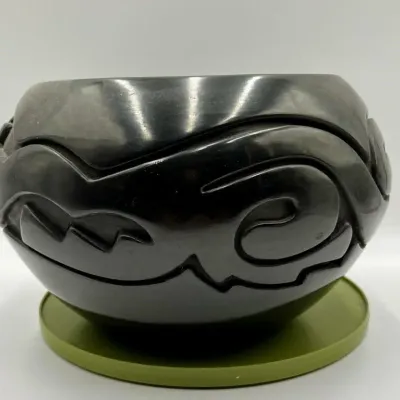 Sale Photo Thumbnail #7: Santa Clara Pueblo blackware pottery bowl featuring a deeply carved avanyu water serpent design with a highly polished finish.