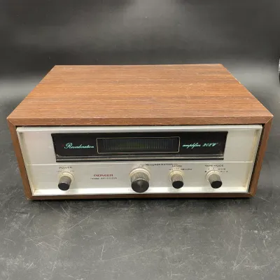 Vintage Pioneer SR-202W reverberation amplifier with a wood-grain cabinet and silver-face control panel, circa 1970s.
