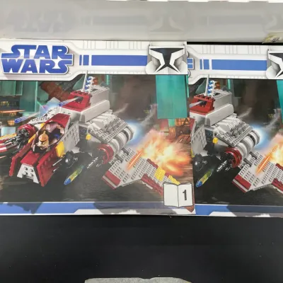 LEGO Star Wars Republic Attack Shuttle instruction manuals for set 8019, books 1 and 2, showing some wear along the edges.