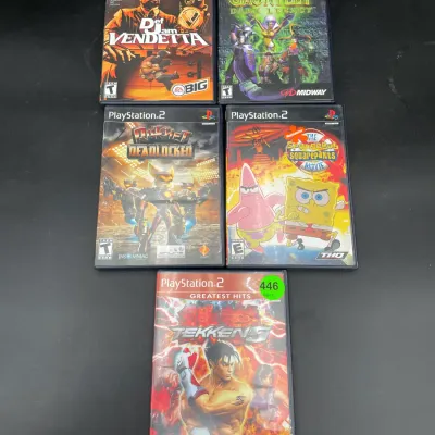 Collection of five PlayStation 2 video games, including Def Jam Vendetta, Gauntlet Dark Legacy, Ratchet: Deadlocked, The SpongeBob...