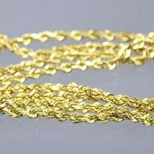 Classic 14k yellow gold rope chain necklace, showing a bright polished finish and a secure clasp.