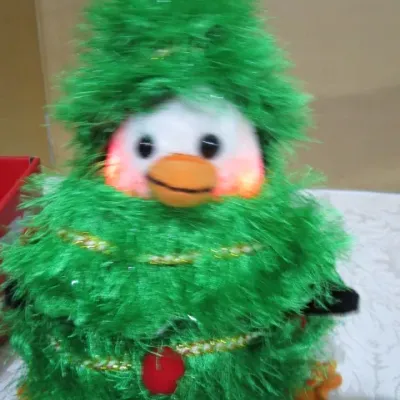 Sale Photo Thumbnail #428: Sings "We Wish You a Merry Christmas", Cheeks light up, Takes 3 AA batteries not included, See pictures
