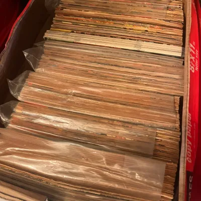 Sale Photo Thumbnail #98: Large collection of vintage comic books, many individually bagged, stored in a cardboard copy paper box.