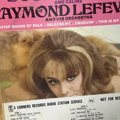 Sale Photo Thumbnail #73: Vintage vinyl record album cover for "Soul Coaxing" by Raymond Lefevre and His Orchestra, featuring a radio station promo sticker on the front.
