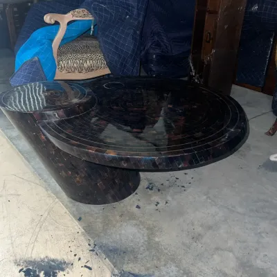 Sale Photo Thumbnail #86: Maitland-Smith style tessellated horn or stone coffee table featuring a tiered, multi-level circular design with a high-gloss finish.