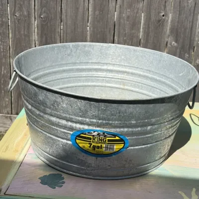King Metalworks 7-gallon galvanized steel tub with side handles, in clean, lightly used condition.