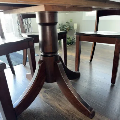 Sale Photo Thumbnail #556: Measures approx. 42x64", already has one leaf inserted and comes with another. Four chairs and one bench.