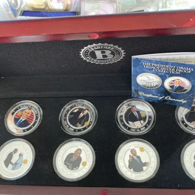 Sale Photo Thumbnail #216: Bradford Exchange commemorative coins honoring President Barac Obama 