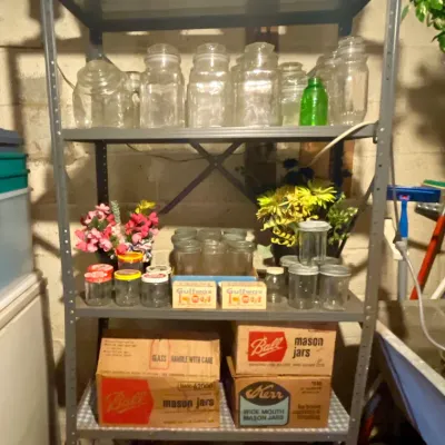 Sale Photo Thumbnail #180: A healthy supply of vintage Mason jars